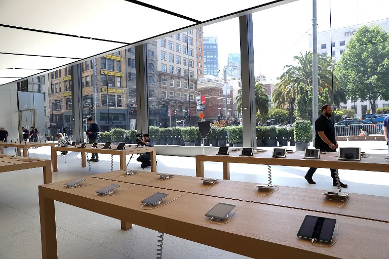SAN FRANCISCO, CA - MAY 19: A view of the new flagship Apple Store on May 19, 2016 in San Francisco, California. Apple is preparing to open its newest flagship store in San Francisco's Union Square on Saturday May 21. The new store features new design elements as well as community programs including the "genius grove" where where customers can get support under a canopy of local trees and "the plaza" a public space that will be open 24 hour a day. Visitors will enter the store through 42-foot tall sliding glass doors. Justin Sullivan/Getty Images/AFP