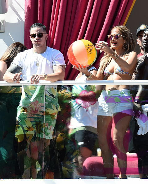 LAS VEGAS, NM - MAY 29: Choreographer/dancer Beau "Casper" Smart (L) looks on as singer/actress Jennifer Lopez prepares to hit a beach ball while hosting the "Carnival Del Sol" pool party at Drai's Beach Club - Nightclub at The Cromwell Las Vegas on May 29, 2016 in Las Vegas, Nevada. (Photo by Ethan Miller/Getty Images)