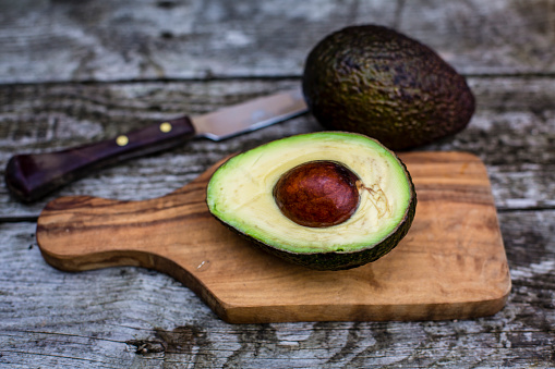Chopped avocado on chopping board