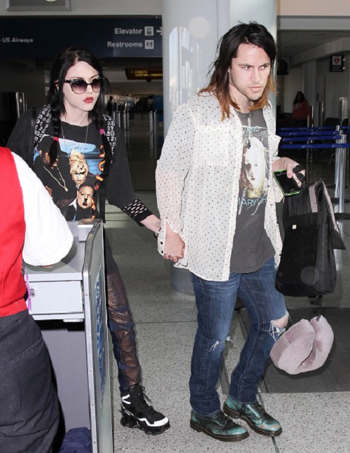 LOS ANGELES, CA - JANUARY 23: Frances Cobain and Isaiah Silva seen at LAX on January 23, 2015 in Los Angeles, California. (Photo by GVK/Bauer-Griffin/GC Images)