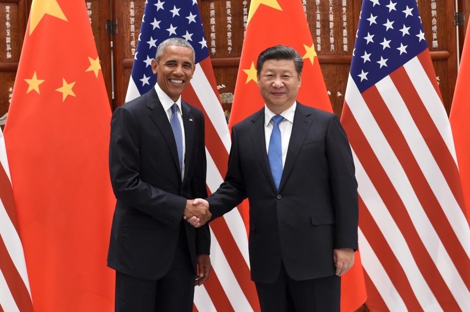 Apretón de manos de los presidentes Barack Obama y Xi Jinping