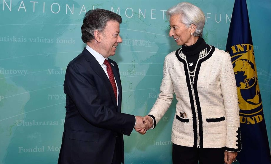 Santos y  directora gerente del FMI Christine-Lagarde.