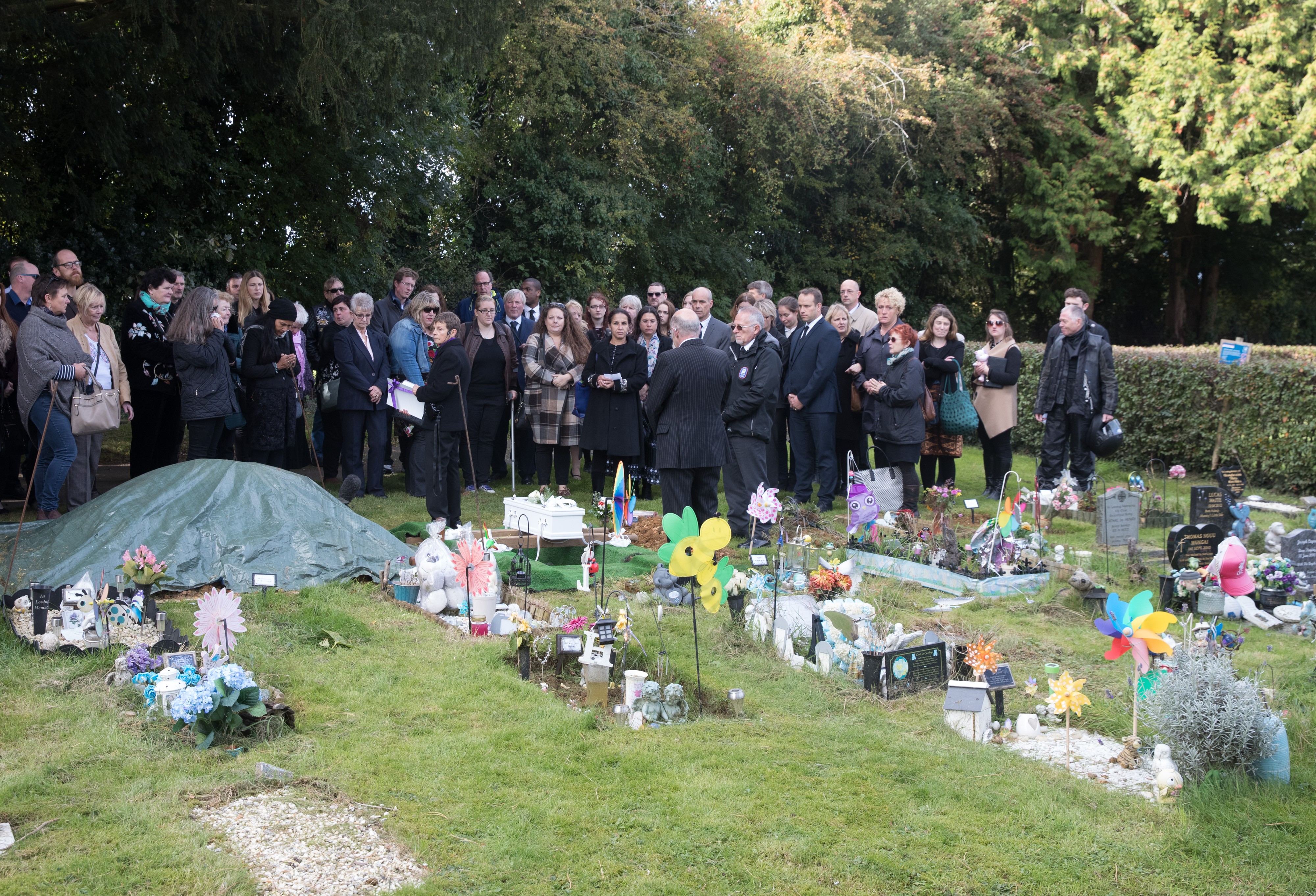 People Gather To Mourn Baby Girl Found On An Oxford Footpath