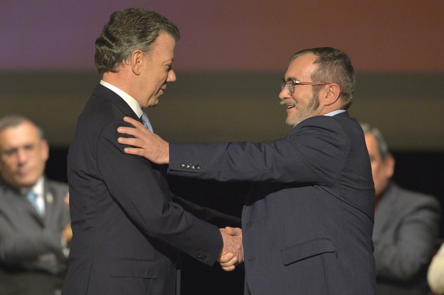 Presidente Juan Manuel Santos y 'Timochenko'
