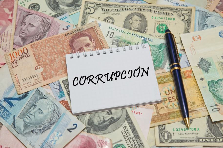 Imagen ilustrativa de la corrupción, con diversas divisas internacionales