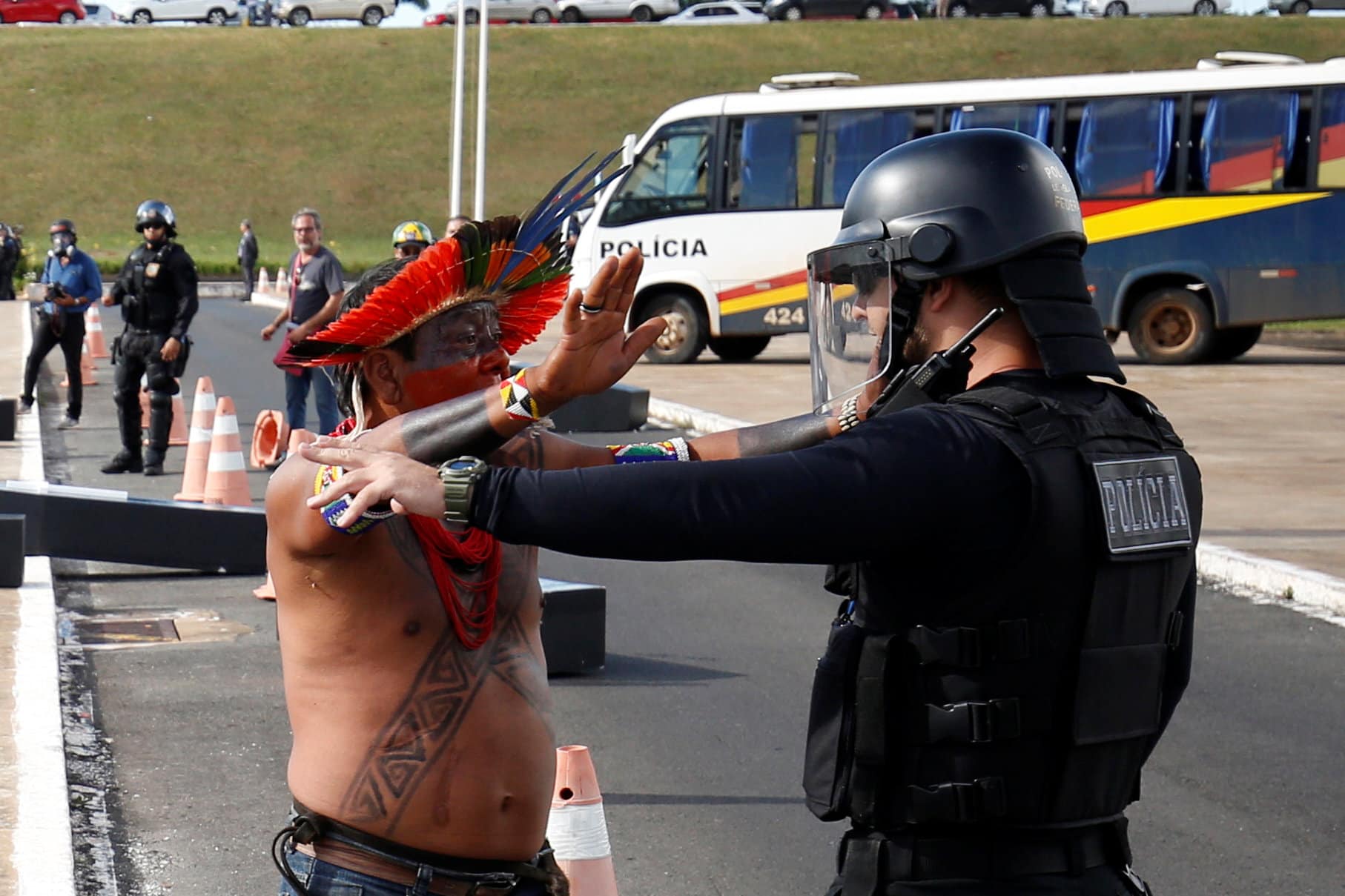 Brazilian Indians take part in a demonstration against the violation of indigenous people's rights, in Brasilia