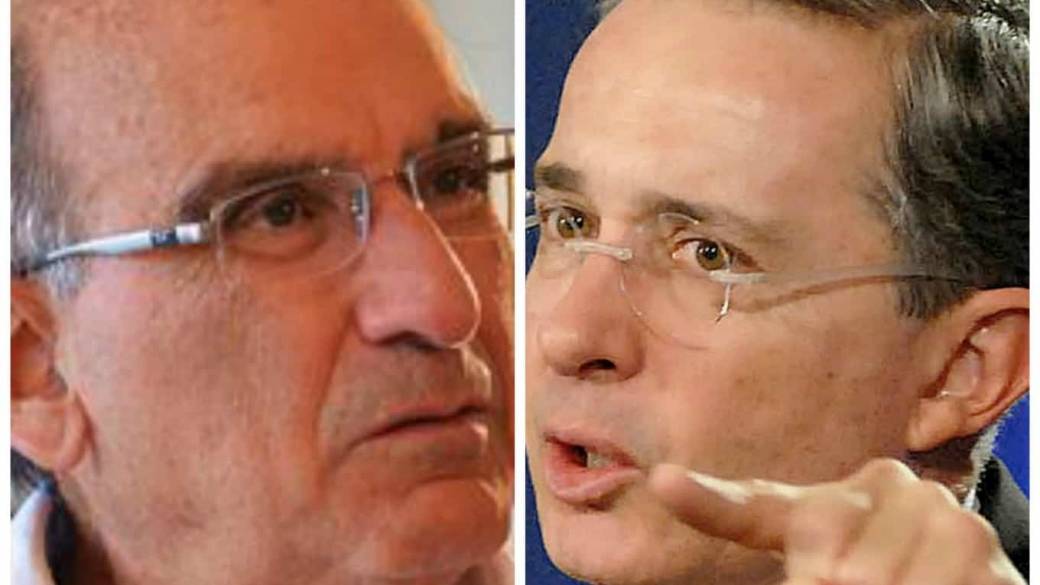 Humberto de la calle y Álvaro Uribe