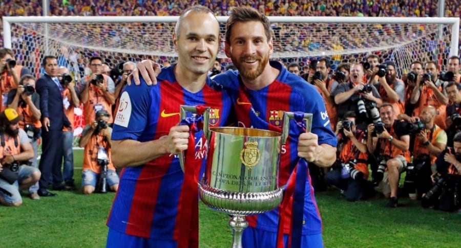 Iniesta y Messi