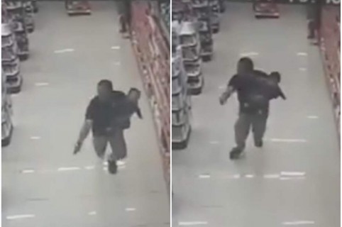 Policía dispara con bebé en sus brazos.