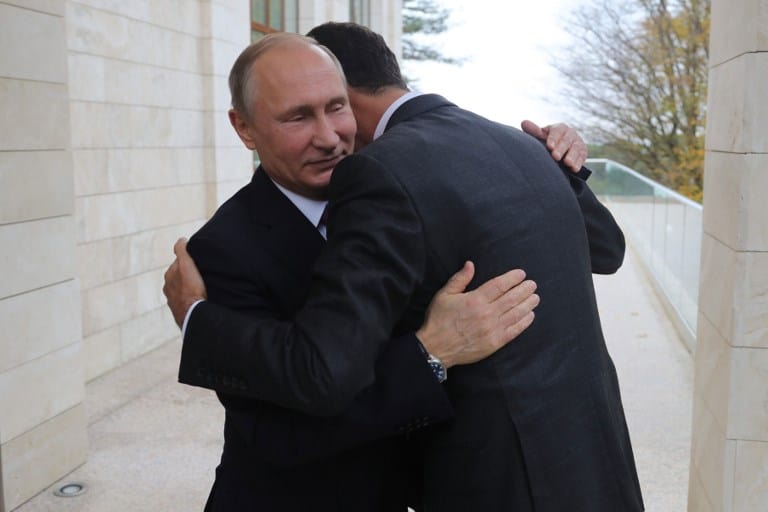 Putin y Bashar al Assad. Pulzo.