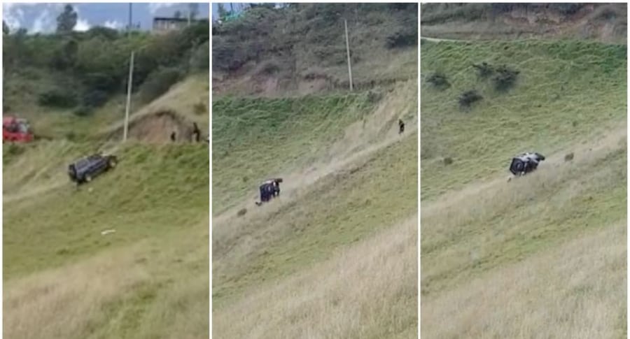 Conductor se cuelga en una colina.
