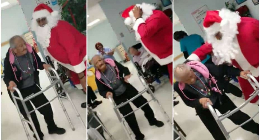 Abuela baila con Papá Noel.