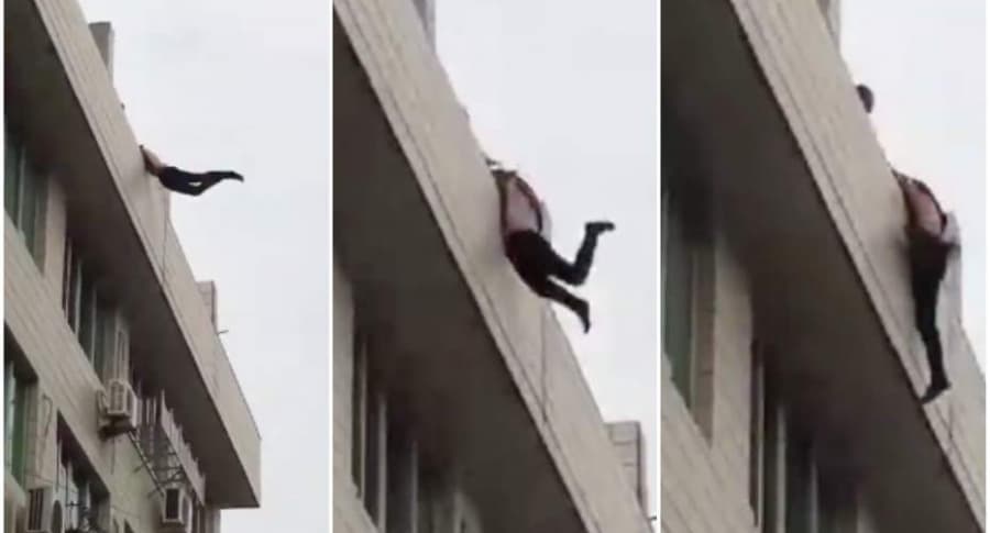 Hombre intenta lanzarse de un edificio.