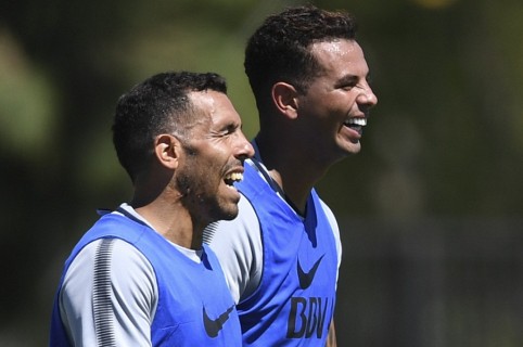 Carlos Tévez y Edwin Cardona