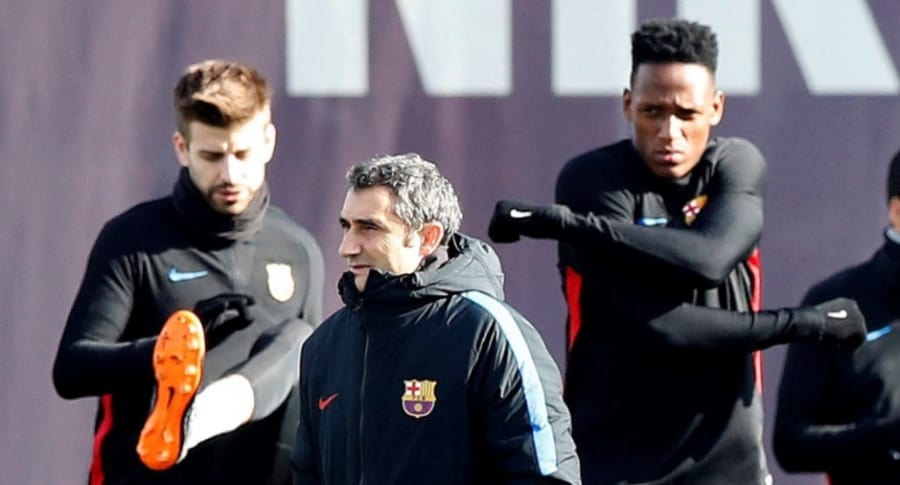 Gerard Piqué, Yerry Mina y Ernesto Valverde