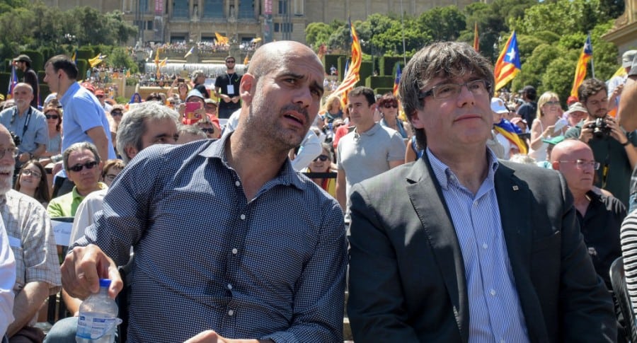 Pep Guardiola y Carles Puigdemont