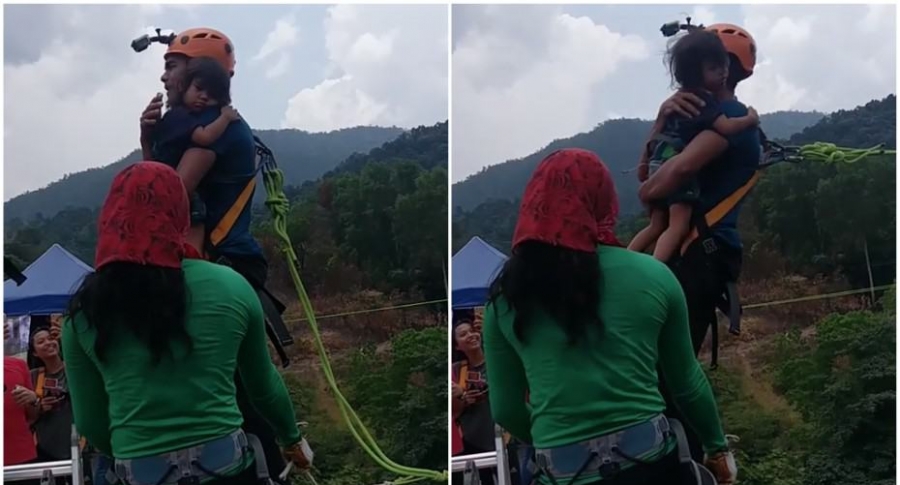 Hombre hace 'bungee jumping' con su hija en brazos.