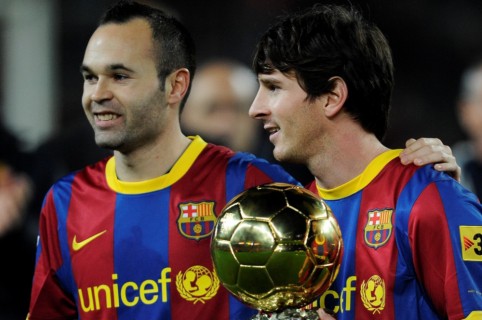 Andrés Iniesta y Lionel Messi