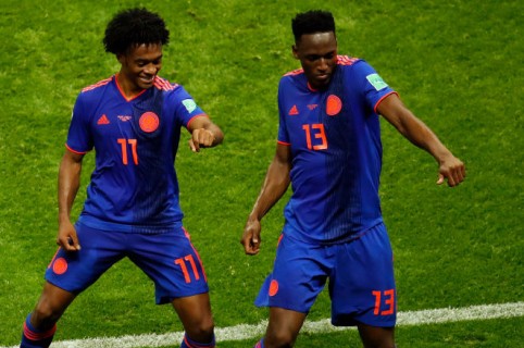 Juan Cuadrado y Yerry Mina