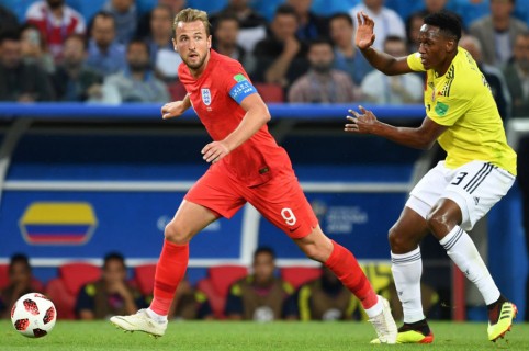 Yerry Mina y Harry Kane