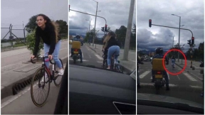 Ciclista se pasa semáforo en rojo.