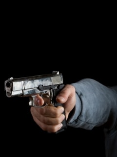 Hombre armado / asesino