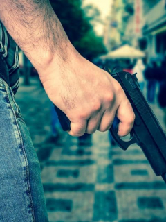 Hombre con pistola.