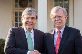 Carlos Holmes Trujillo y John Bolton