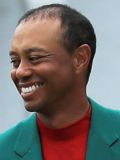 Faustino Asprilla y Tiger Woods