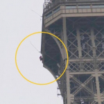 Hombre escala Torre Eiffel
