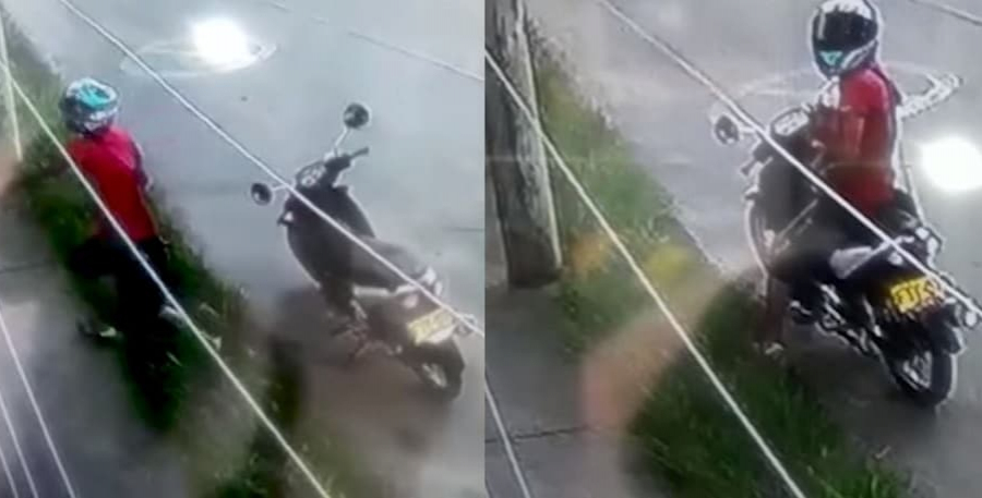 Hombre robando en motocicleta