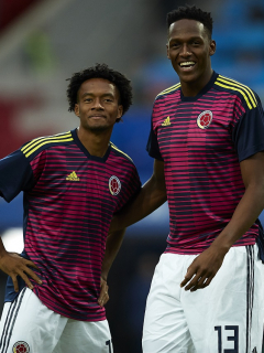 Juan Guillermo Cuadrado y Yerry Mina