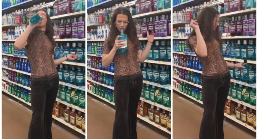 Mujer prueba enjuage bucal en supermercado.