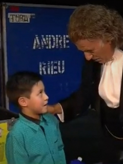 Andre Rieu y niño flautista