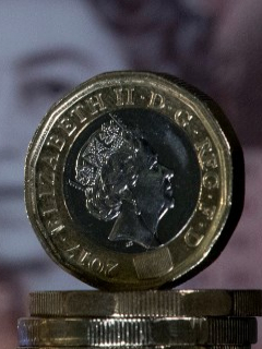 Moneda de Euro y moneda de Libra