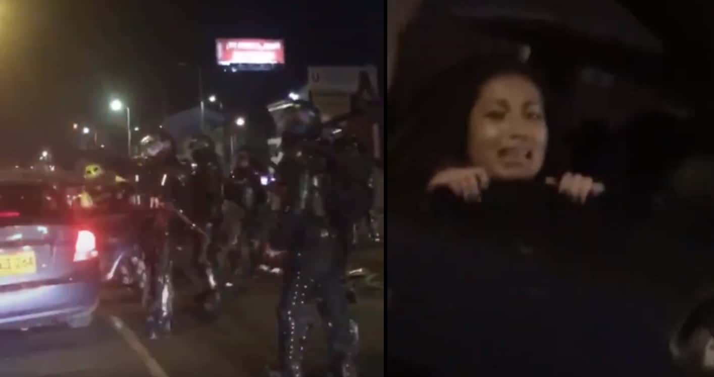 Manifestante subida a carro sin identificar Bogotá