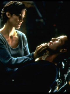 Carrie-Anne Moss y Keanu Reeves