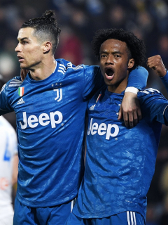 Juan Guillermo Cuadrado y Cristiano Ronaldo