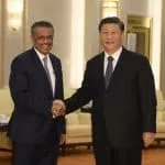 Tedros Adhanom y Xi Jinping,