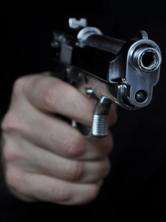 Hombre con pistola.