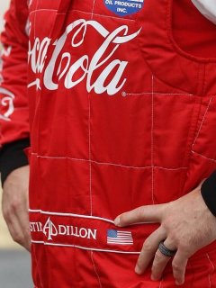 Overol de F-1 con logo de Coca-Cola