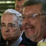 Álvaro Uribe y su defensor Jaime Granados