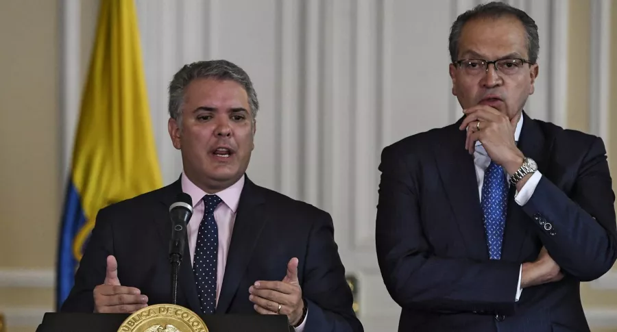 Iván Duque y Fernando Carrillo, procurador general que criticó la gestión del Gobierno ante las masacres