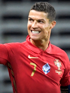 Portugal's forward Cristiano Ronaldo celebrates scoring the opening goal, his 100th goal for Portugal, during the UEFA Nations League football match between Sweden and Portugal on September 8, 2020 in Solna, Sweden. (Photo by Janerik HENRIKSSON / TT NEWS AGENCY / AFP) / Sweden OUT