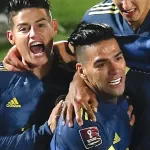 Colombia's Radamel Falcao (C) celebrates with teammates after scoring against Chile during their 2022 FIFA World Cup South American qualifier football match at the National Stadium in Santiago, on October 13, 2020, amid the COVID-19 novel coronavirus pandemic. (Photo by Alberto Valdes / POOL / AFP)