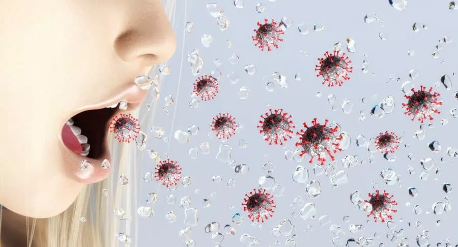 Imagen artística de aerosoles de coronavirus para ilustrar nota sobre prueba de aliento que permitiría detectar la COVID-19