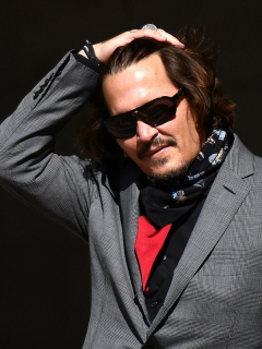 Johnny Depp, que acaba de perder la batalla jurídica contra el diario The Sun, cuando llegaba a una de las audiencias del proceso, el 21 de julio de 2020.