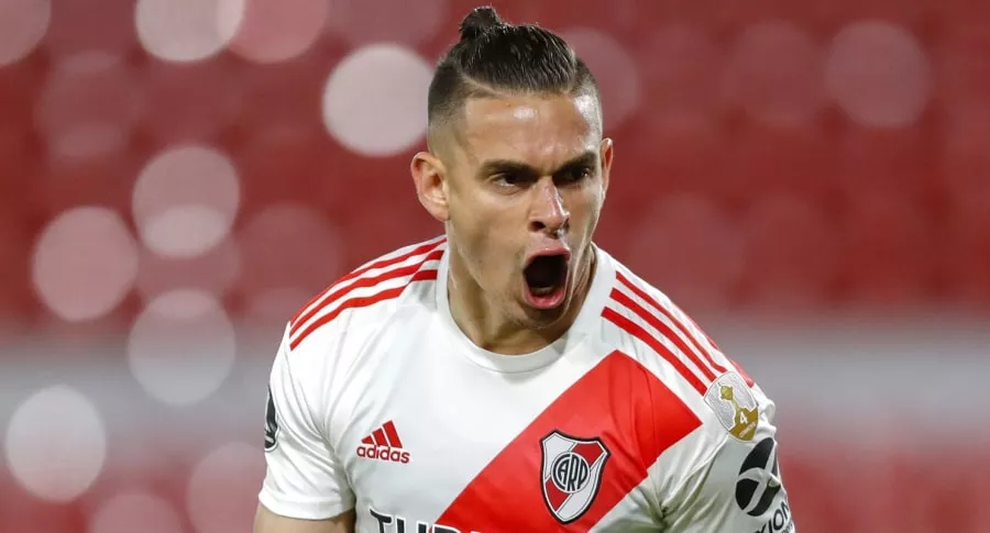 Argentina's River Plate forward, Colombian Rafael Santos Borre, celebrates after scoring against Ecuador's Liga de Quito, during their closed-door Copa Libertadores group phase football match at the Libertadores de America (Monumental) Stadium in Avellaneda, Buenos Aires, Argentina, on October 20, 2020, amid the COVID-19 novel coronavirus pandemic. (Photo by AGUSTIN MARCARIAN / various sources / AFP)