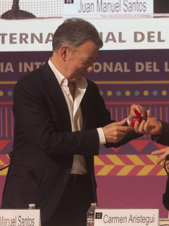Juan Manuel Santos y Rodrigo Londoño ('Timochenko') en un evento en México.