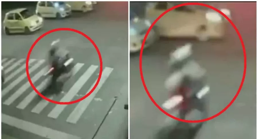 Motociclista que se chocó con taxi, por pasarse semáforo en rojo en Bogotá